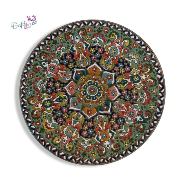 The "Scholar's Bloom" enameled plate shown as a prestigious wall-hanging feature in a modern luxury study or office setting.