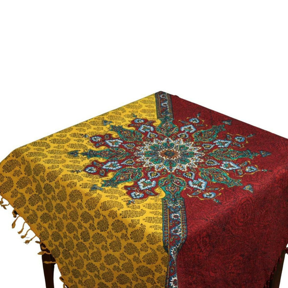 A premium handmade Persian Ghalamkari tablecloth displayed on a large dining table in a high-end home.