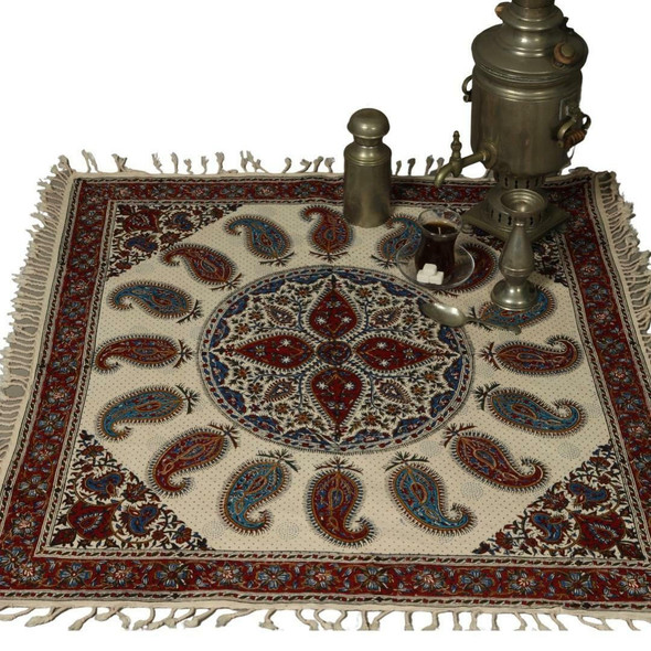 A premium 100x100 cm handmade Ghalamkari cotton cloth titled "The Heritage Square" featuring a large indigo and red central paisley pattern.