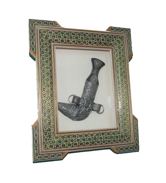 Detailed view of Khatamkari mosaic art on wood frame, showing intricate brass and bone geometric inlay patterns.