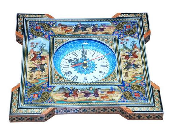 A luxury round Khatam-kari wall clock with gold brass inlays and a traditional Persian star pattern