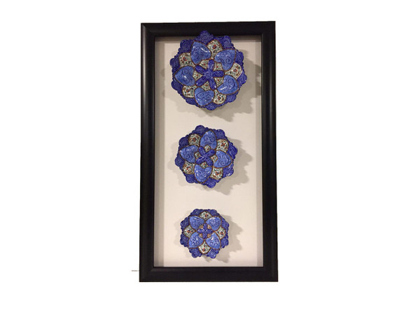 A sophisticated, framed set of three hand-painted plates, perfect as a thoughtful housewarming or special occasion gift.