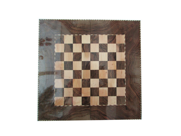 The interior of a Sanandaj backgammon board featuring master-crafted marquetry and dark walnut wood.