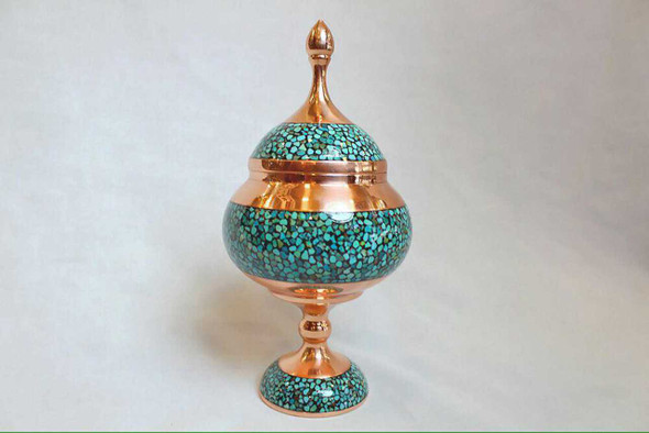 A large Persian pedestal candy bowl featuring intricate turquoise inlay on a hand-hammered copper body