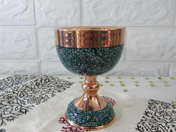Close-up of the fluted, scalloped edges of the copper bowl showing the precise placement of turquoise stones