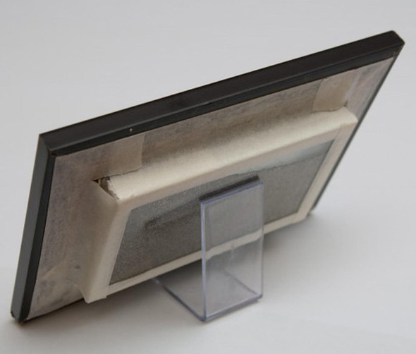 A beautiful "Seven Sands" moving sand keepsake, perfect for adding a tranquil and artistic touch to any room or desk.