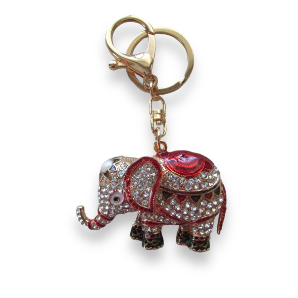 A premium Craftihouse gold-tone keychain shaped like an elegant elephant, designed as a decorative and functional accessory.