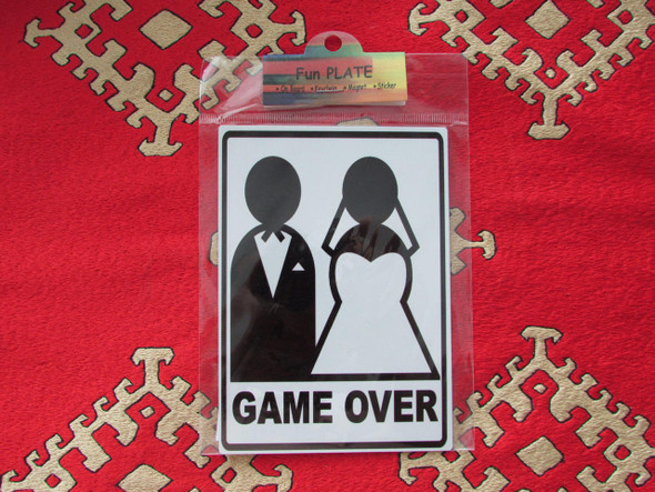 A vibrant 11x9 cm vertical aluminium fridge magnet featuring a humorous 'Game Over' wedding design with bride and groom silhouettes.