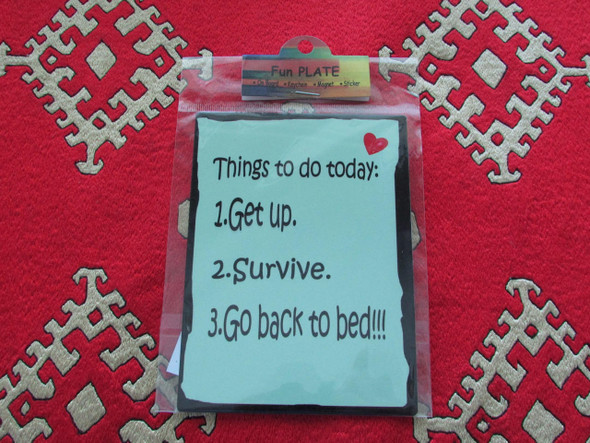 An artisan 11x9 cm aluminium fridge magnet featuring a clear, lighthearted quote, perfect for adding personality to a kitchen or office space.