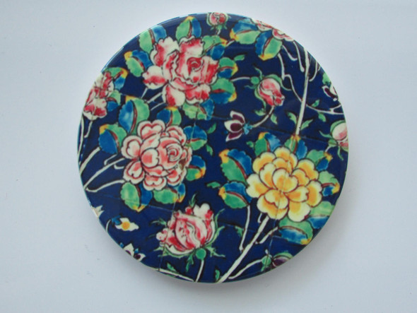 Detailed view of the intricate floral design on our 9 cm ceramic coaster