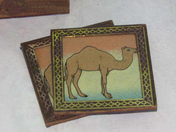 An exclusive Craftihouse wooden coaster set, designed to bring traditional Middle Eastern heritage and tabletop elegance to home interiors.