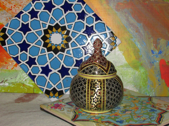 A luxury hand-hammered copper candy bowl featuring wide bands of intricate Khatamkari marquetry on the body and lid.