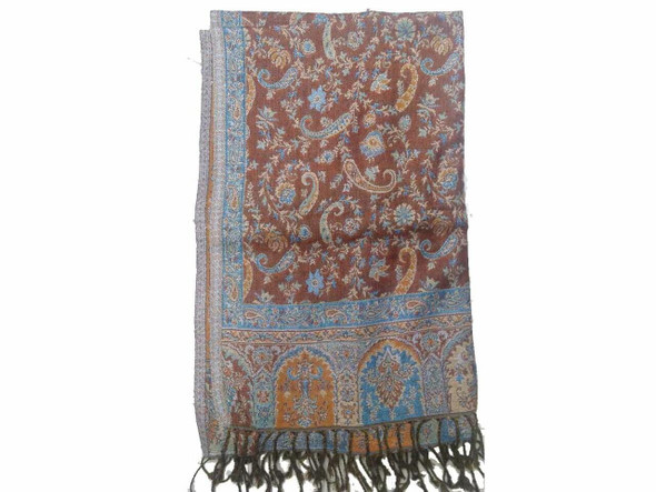 An elegantly draped hand-loomed yak wool scarf, showcasing its natural warmth and breathable fabric.