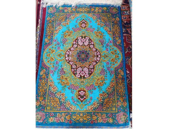 silk carpet 
qom carpet