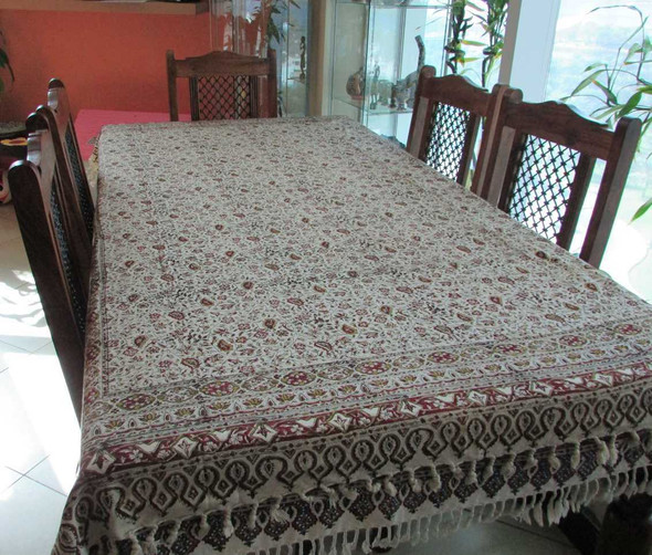 Close-up of the Ghalamkar fabric showing the unique imperfections and textures of the hand-stamped wooden block printing process.