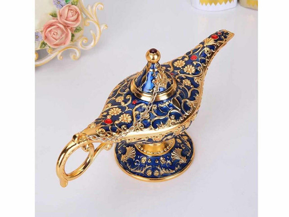 A stunning 32 cm royal blue and gold Aladdin's lamp, the perfect authentic souvenir gift to take home from your Dubai trip. Discover more at Craftihouse.