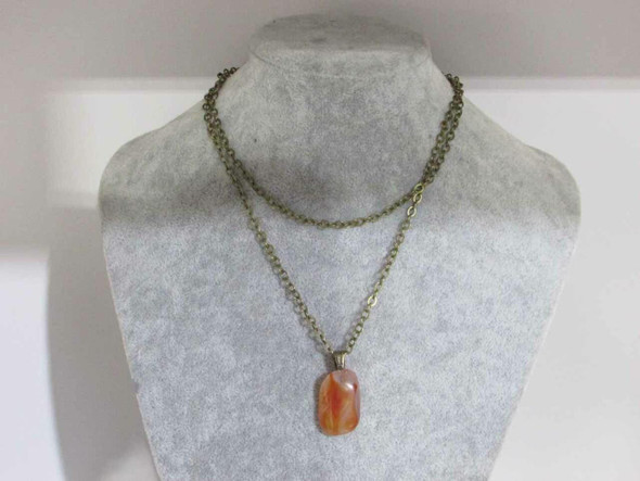 Handcrafted handmade necklace with red agate and brass chain Lifestyle Visual