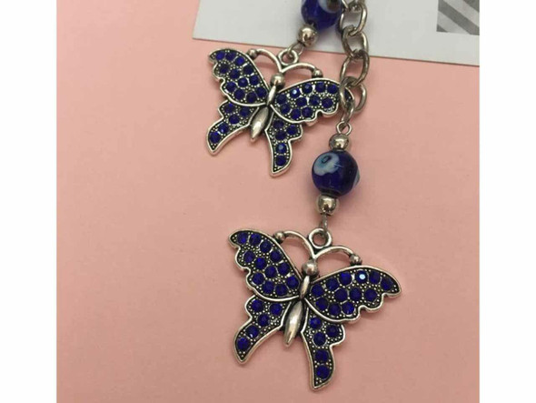 Luxury Artisan butterfly blue eye key Premium Design Showcase