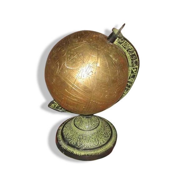 Detailed view of the intricate engravings on this brass globe, an ideal artisan gift for travelers and history enthusiasts.