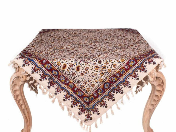 A professional presentation shot of the square 100x100 cm artisan cotton table cloth displayed against a clean background.