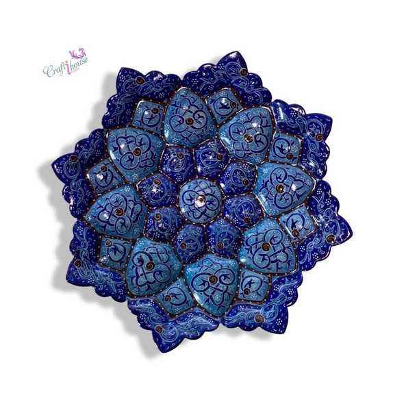 A professional product presentation of the exclusive handmade royal blue Minakari copper art piece from a premier UAE shop.