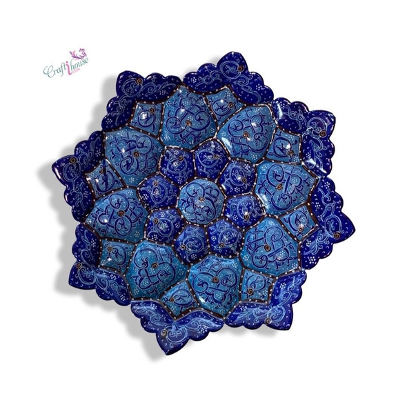 A professional product presentation of the exclusive handmade cobalt mosaic Minakari copper art piece from a premier UAE shop.
