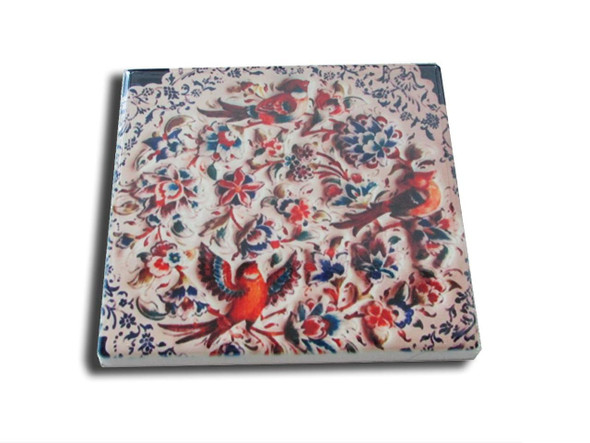 A sophisticated square ceramic coaster that blends functional design with a rich, traditional artistic motif.