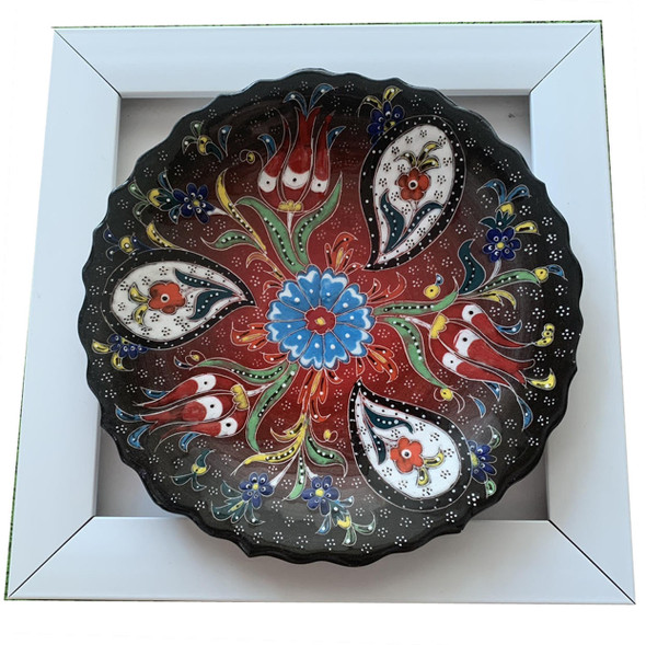 A stunning 18 cm handmade embossed ceramic plate with vibrant folk art patterns set in a premium 22x22 cm gallery frame for wall decor.