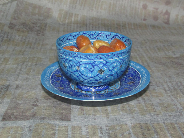 A premium 2-piece hand-painted Minakari copper set featuring a 12 cm plate and a matching 8 cm bowl with vibrant blue enamel patterns.