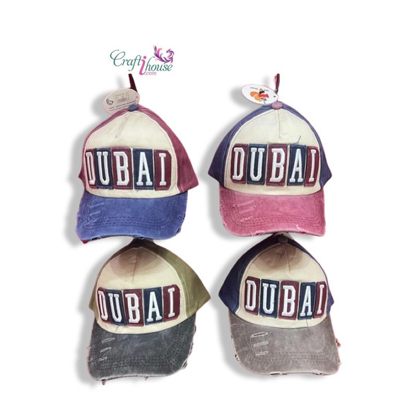 A professional product presentation of the Dubai distressed patchwork cap from a premier UAE art, gift, and souvenir supplier.