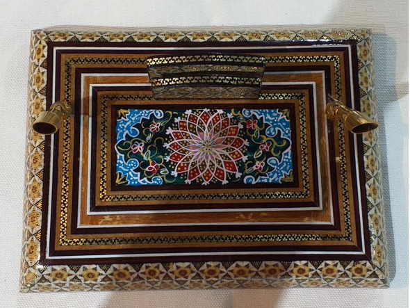 An elegantly designed pen holder showcasing traditional Persian Khatamkari techniques and delicate hand-painted motifs.