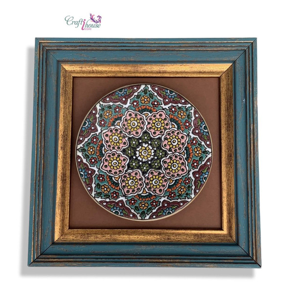 A professional shadow box display shot of the framed 16 cm decorative plate, highlighting its rich aesthetic and wooden frame finish.