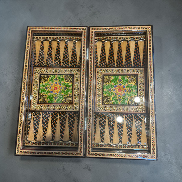 The interior backgammon field shown open, revealing the vibrant hand-painted motifs and high-gloss protective finish.