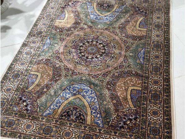 Close-up of the ultra-fine light-reflecting fibers showing the soft, velvety texture and brilliant sheen of the rug.