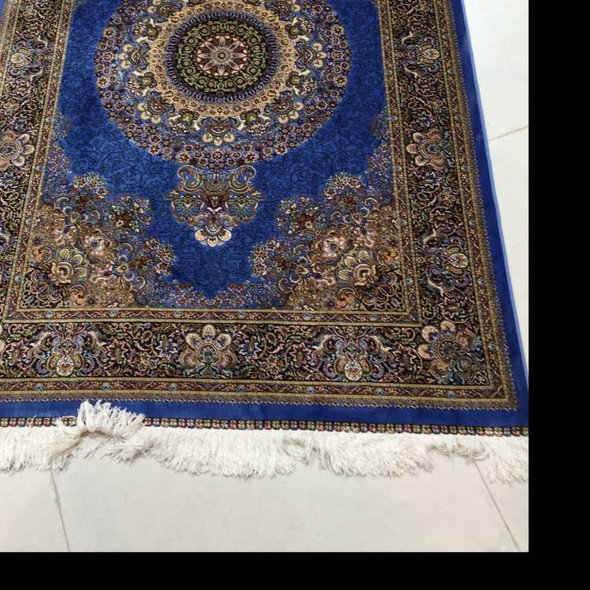 Close-up of the high-density blue silk-like fibers showing the reflective lapis-toned luster and soft texture.