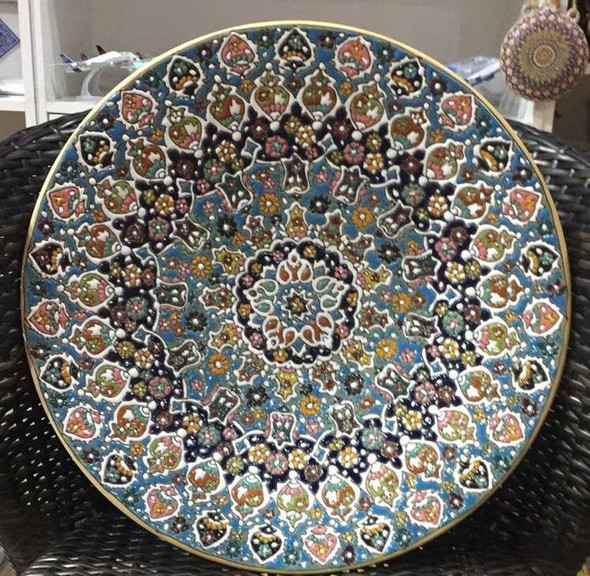 Close-up of the intricate hand-painted motifs and the durable, light-reflecting food-safe finish on the 40 cm clay serving dish.