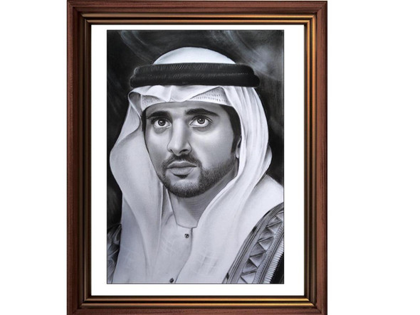 An original A3 size charcoal portrait painting of H.H. Sheikh Hamdan Bin Mohammed framed in classic dark wood.
