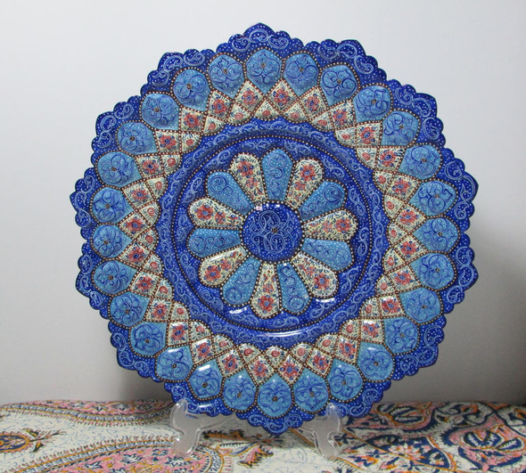 A premium 30 cm hand-painted Meenakari copper plate titled "The Azure Starburst" featuring vibrant blue and white layered floral enamel patterns.