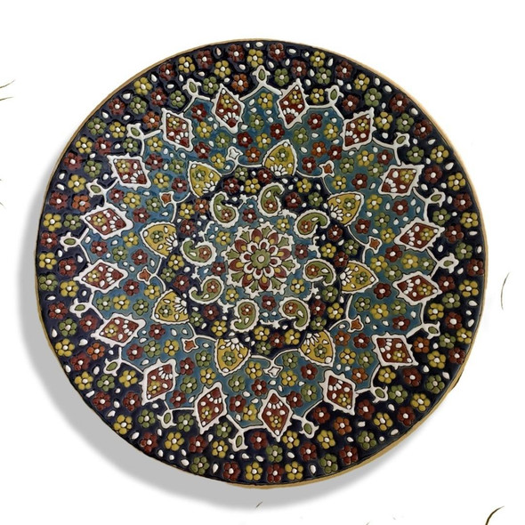 Close-up of the raised hand-pressed textures and intricate hand-painted floral motifs on the 40 cm grand ceramic pottery plate.