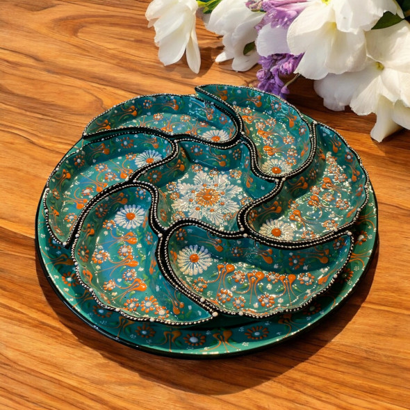 A vibrant hand-painted Turkish ceramic meze set featuring intricate floral patterns and a circular serving tray