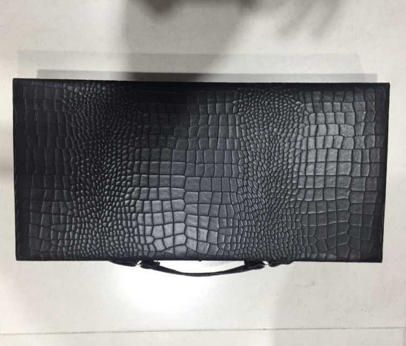 The 48x48 cm traveller backgammon set fully open, showing the intricate printed Eslimi arabesque pattern.