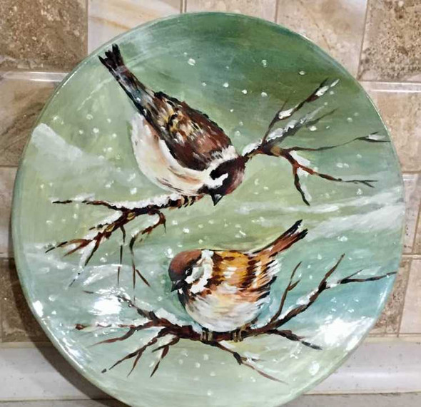 A professional product presentation of the customized clay plate wall decor from a premier UAE art, gift, and home decor supplier.