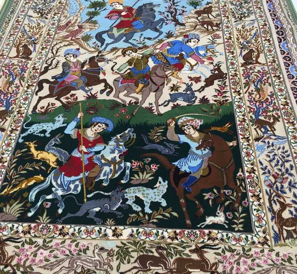 Close-up view of the fine hand-knotted wool and silk weave, vibrant artistic colors, and complex historical storytelling motifs on the carpet tapestry.