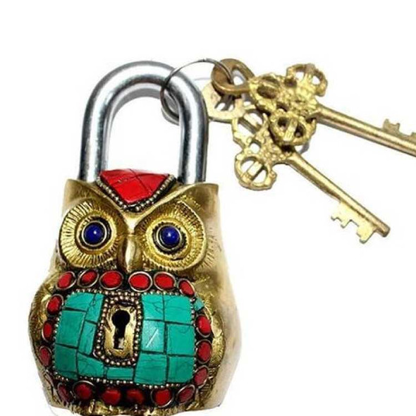 A 12 cm handmade brass owl lock featuring vibrant turquoise and coral inlays with two skeleton keys.
