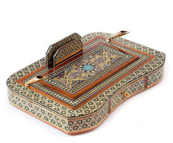A professional product presentation of the exclusive handmade Khatamkari wooden desk set and inkstand from a premier UAE shop.