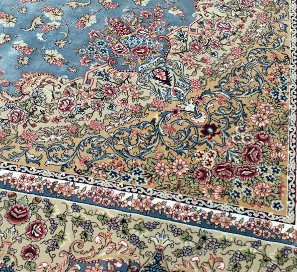 Close-up of the ultra-soft premium silk-like fibers showing the reflective luster and intricate floral weaving.