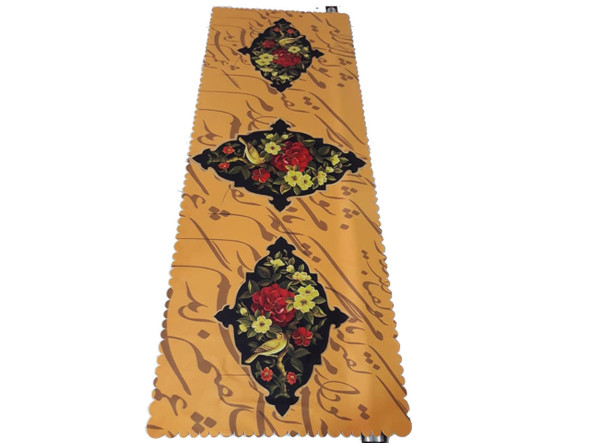 A professional product shot of the 130x50 cm printed velvet table runner styled elegantly on an outdoor surface with a matching decorative vase.
