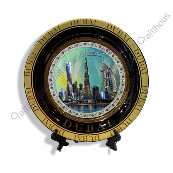A 21 cm decorative souvenir plate from Dubai featuring a colorful skyline image and a golden embossed border.