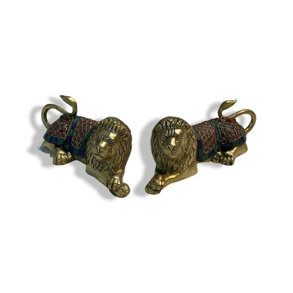 A set of two brass lion sculptures with colorful decorative inlay, highlighting exceptional craftsmanship.