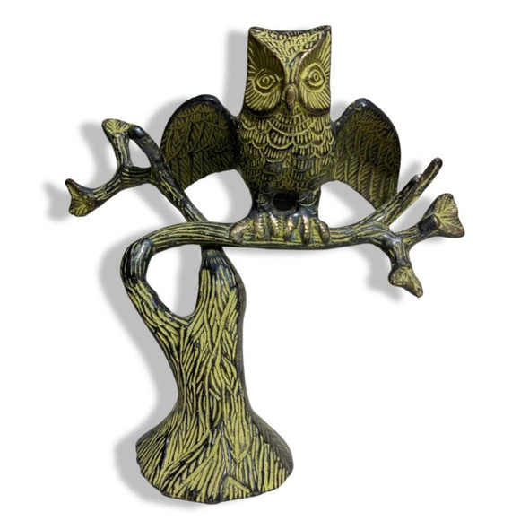 A brass owl on a branch, an Owl sculpture, an Owl statue, an Owl figure,